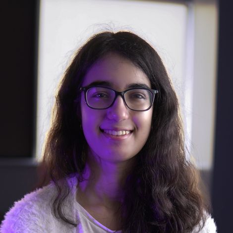 Photo of Sara Nadeem looking into the camera