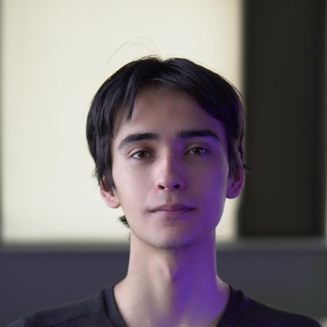 Photo of Ken Burgess looking into the camera