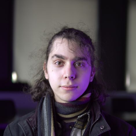 Photo of George Newton looking into the camera