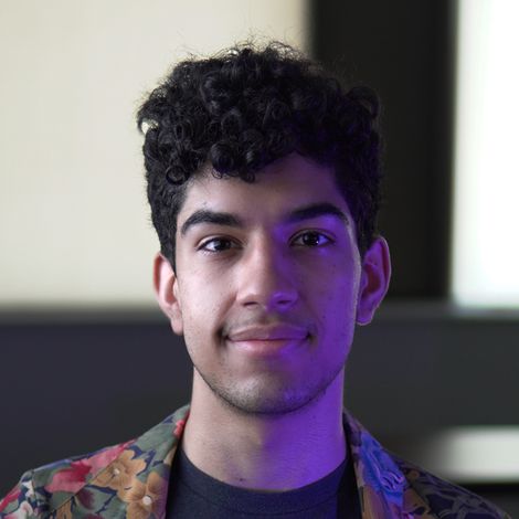 Photo of Quinn McMahon looking into the camera